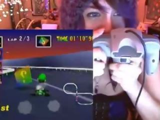 Geek sweetheart cums playing Mario Kart
