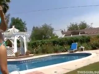 Petite beauty stripping and sucking putz by the pool