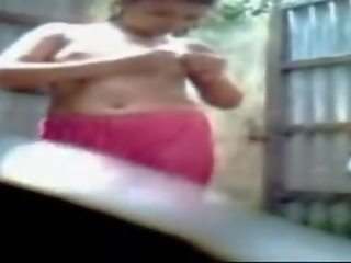 Bengali young woman Taking Bath