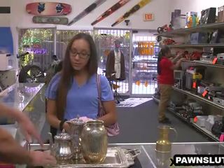 Geeky brunette stunner trying to get a deal at the pawn shop